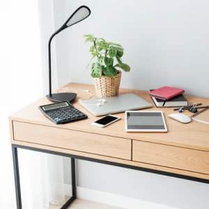 What are the benefits of using a standing computer writing desk?